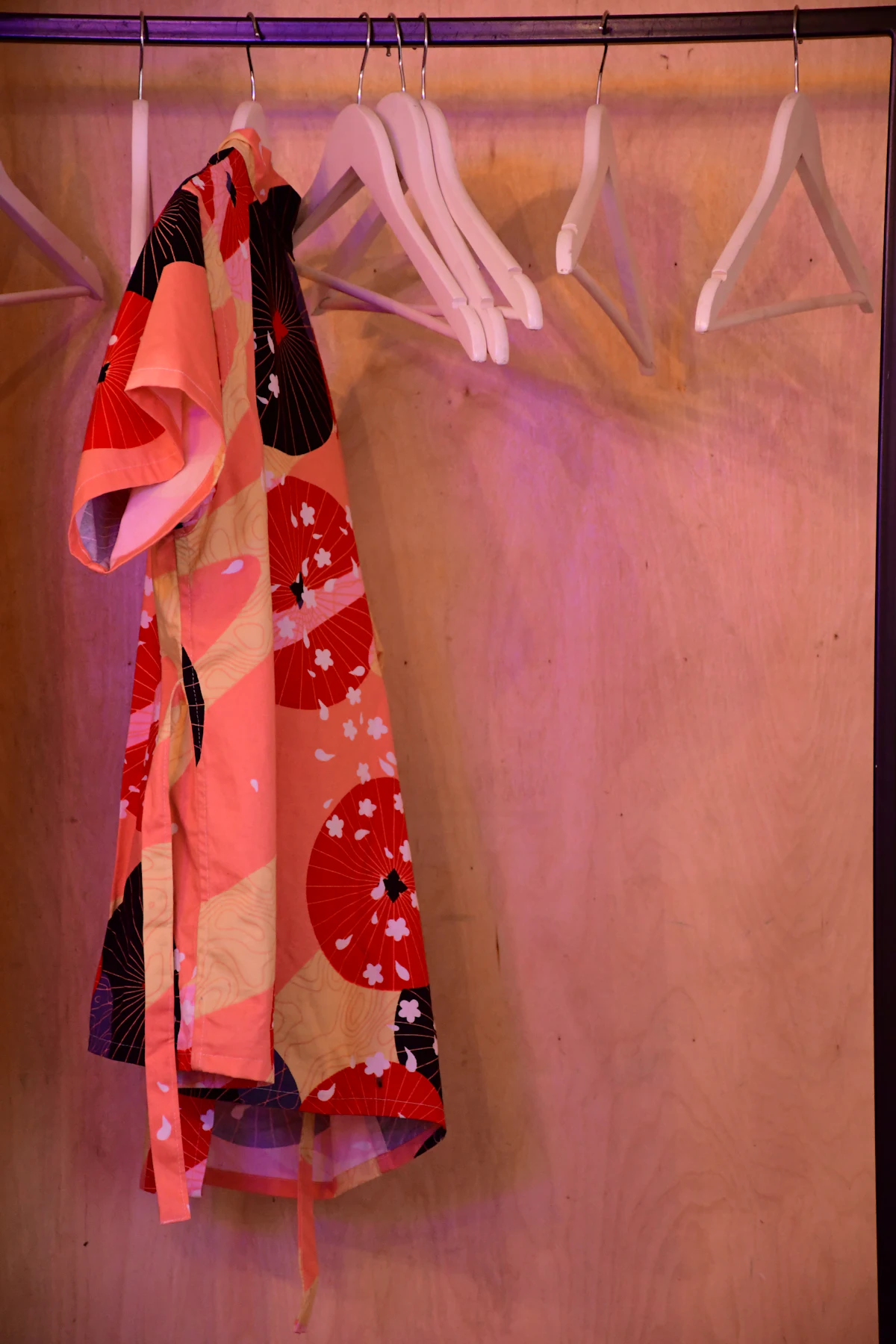 Patterned kimono hanging on a rack