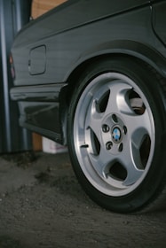 Close-up of a vintage BMW wheel and tire
