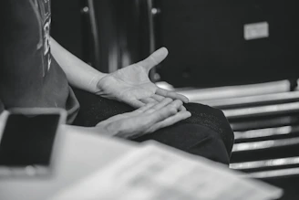 Person gesturing with hands during conversation