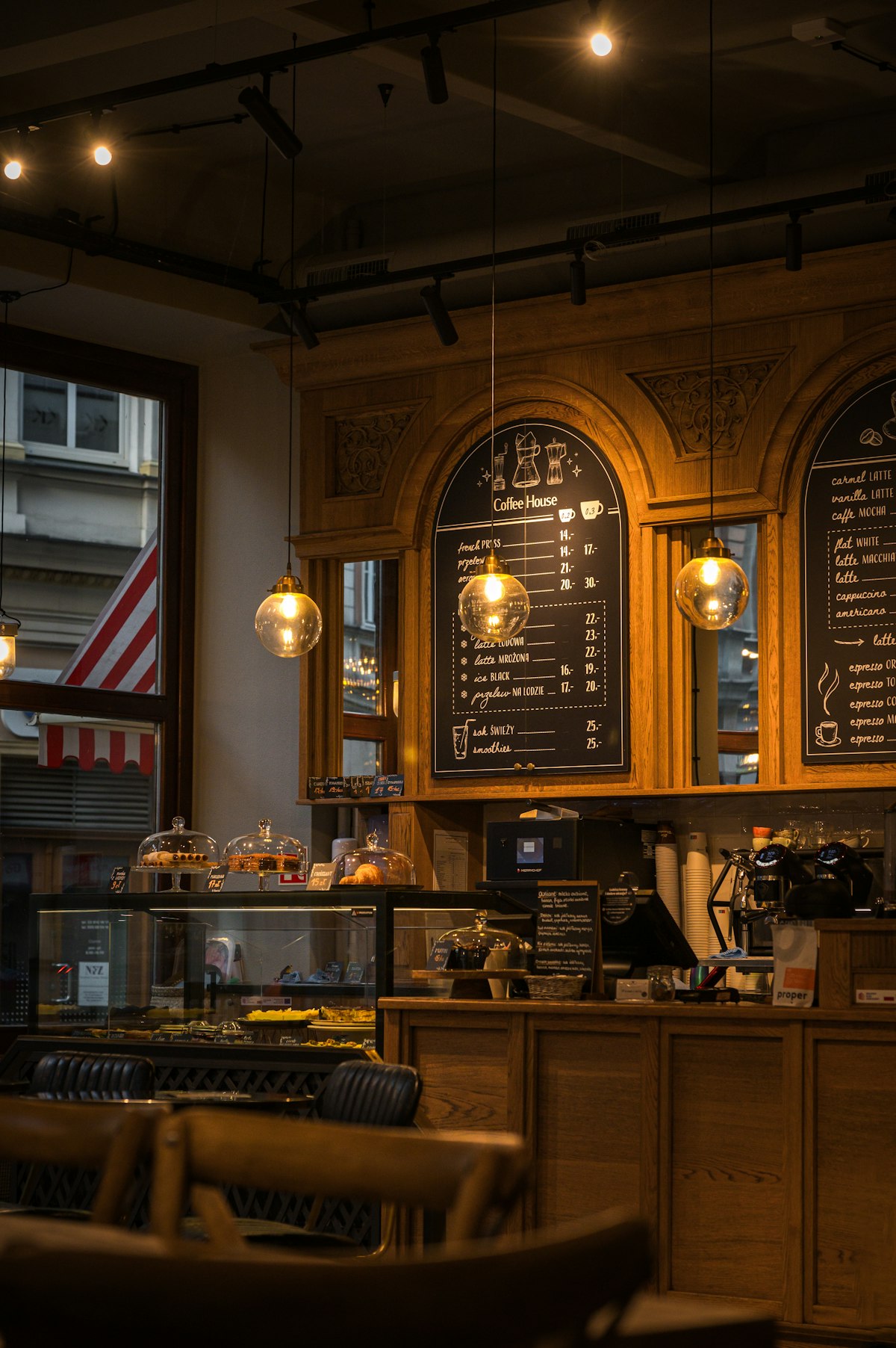 Menu boards displayed on the wall of a cafe
