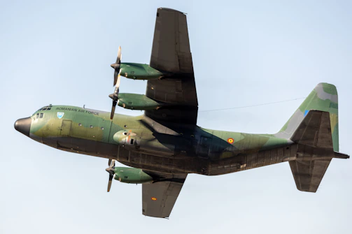 A military cargo plane flying in the sky