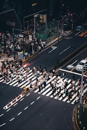 Crowded crosswalk in a busy city street