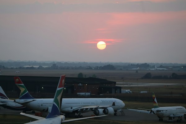 A plane on the apron at sunset — Johannesburg, South Africa