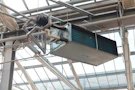 Industrial hvac unit hanging from ceiling structure