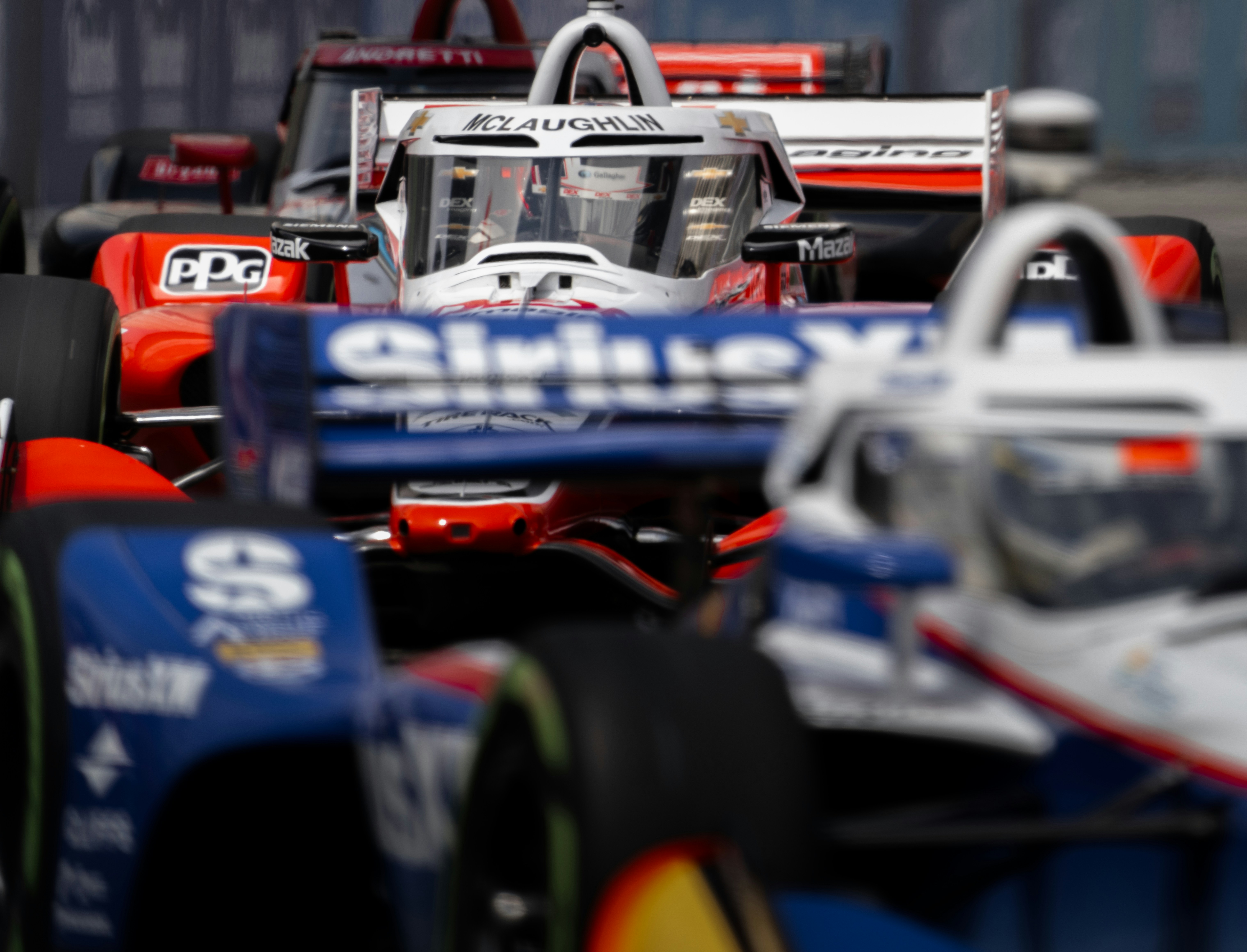 Race cars in a row on track