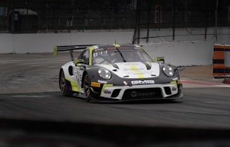 A race car speeds around a track.