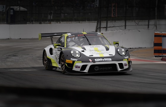 A race car speeds around a track.