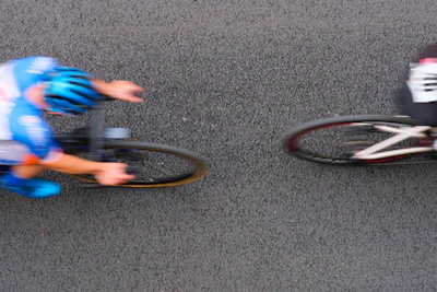 Cyclists racing on a road with motion blur