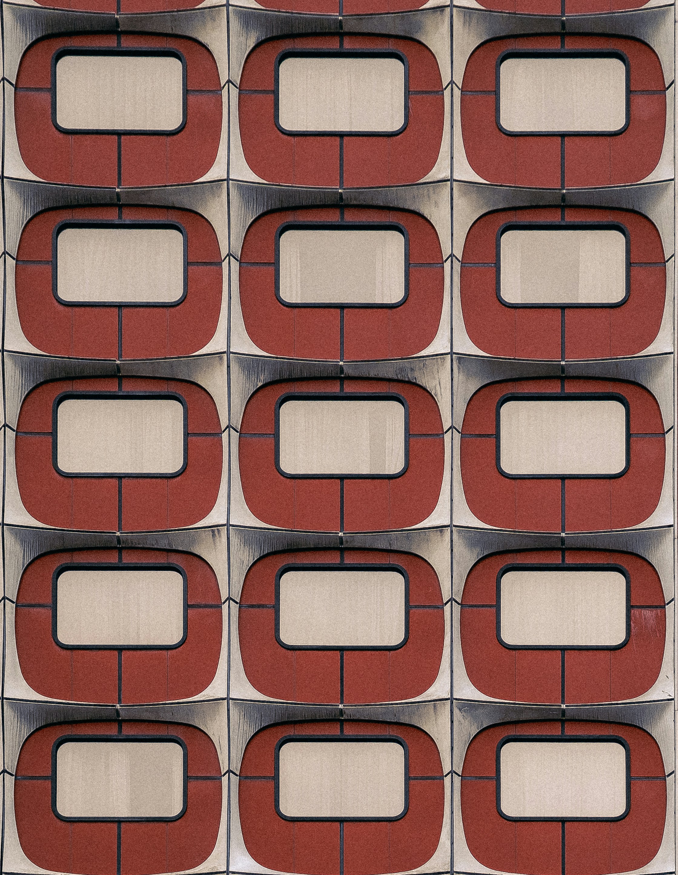 Repeating pattern of red and white rectangular shapes.