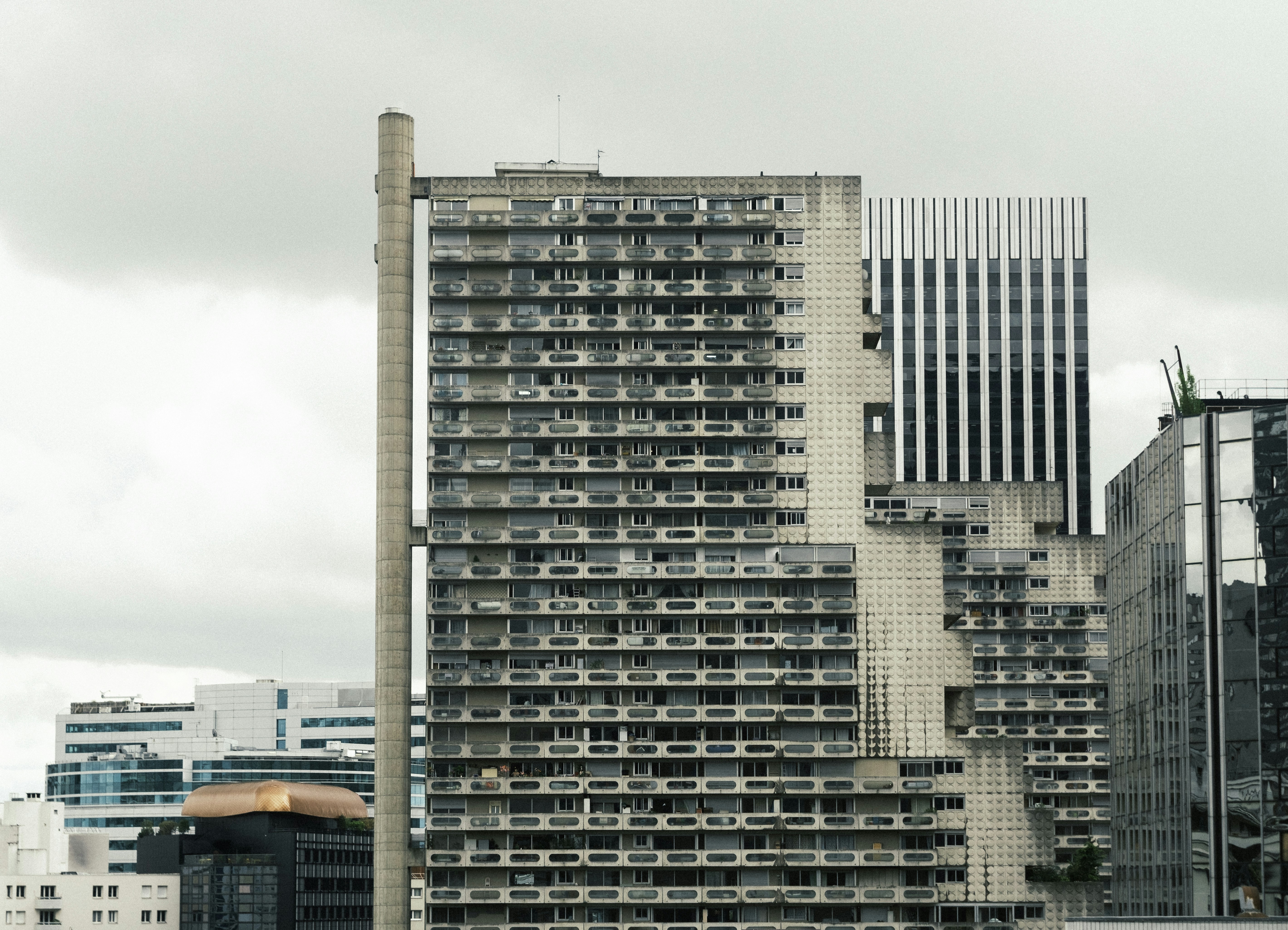 Modern apartment buildings against a cloudy sky