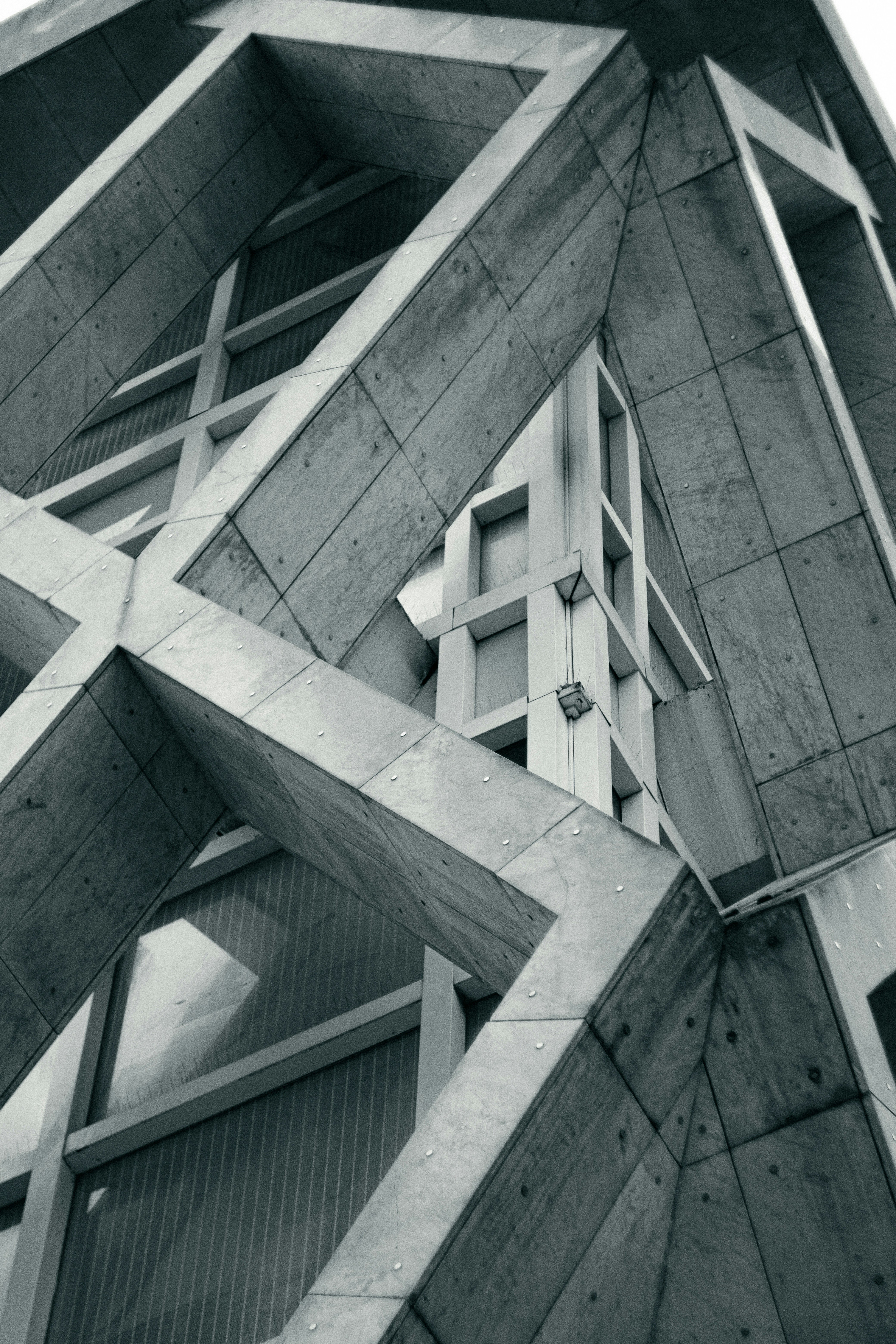 Geometric concrete structure with glass windows