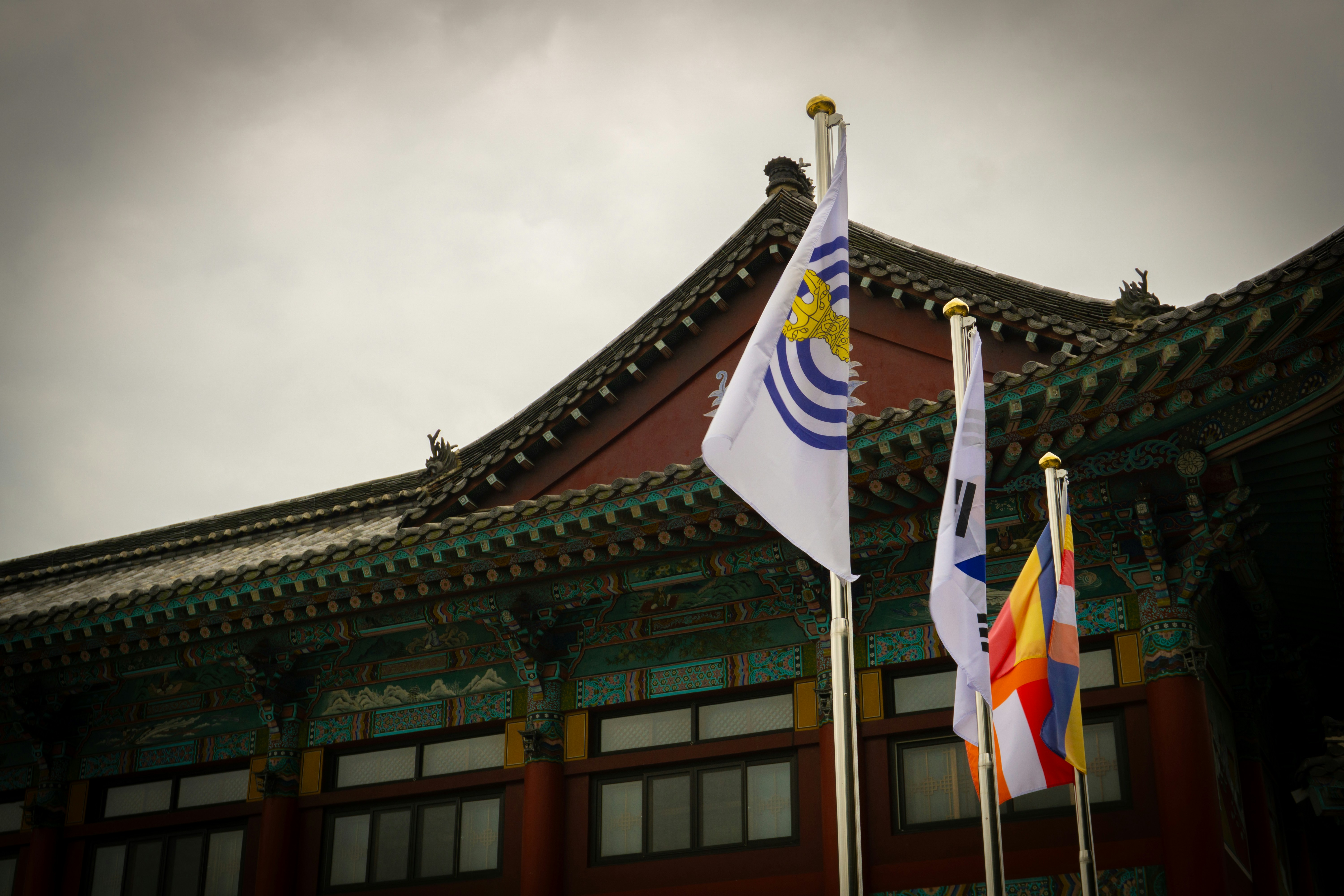 Flags in front of a traditional building