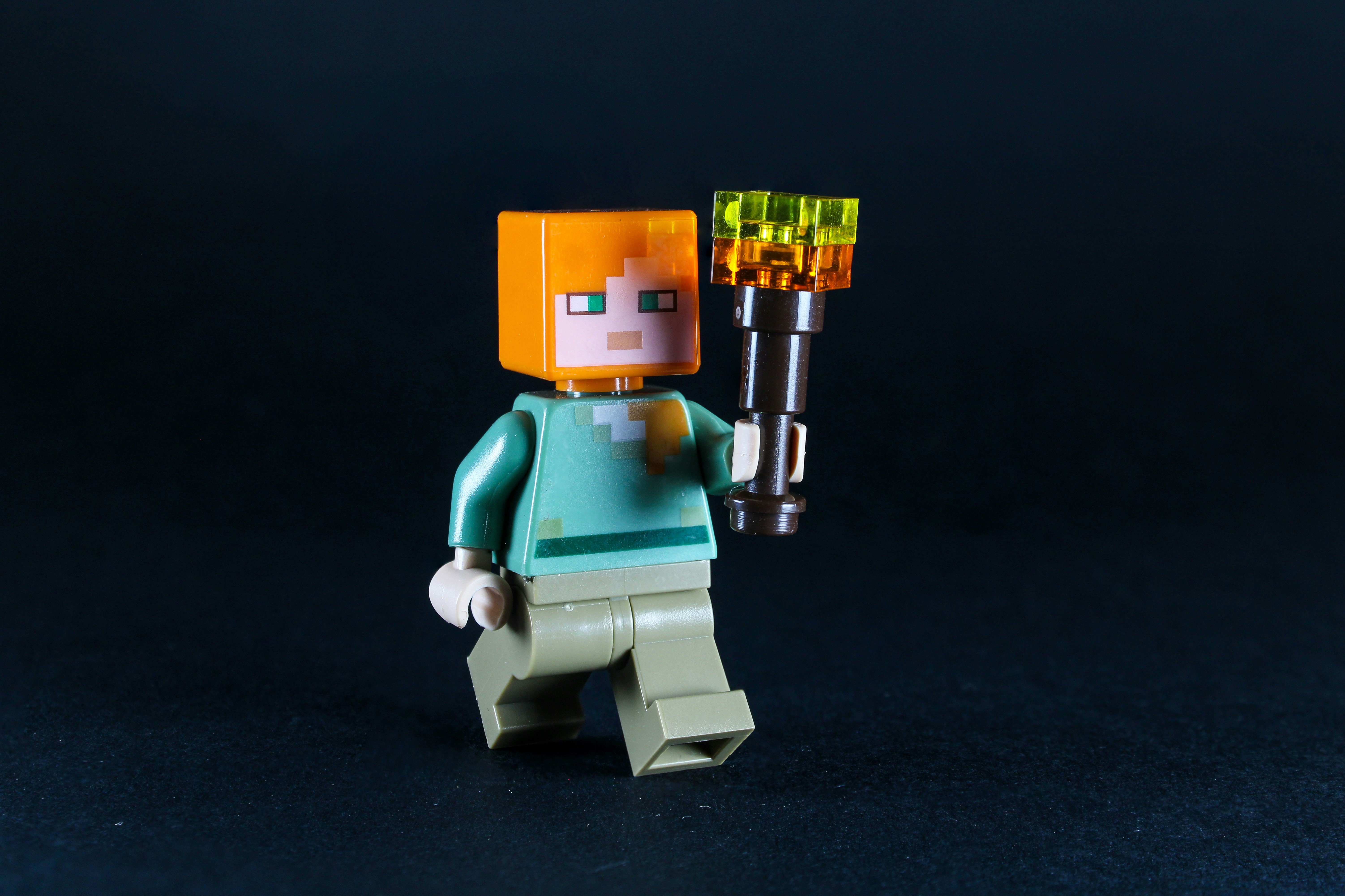 Creative professional designing AI digital character personality on laptop