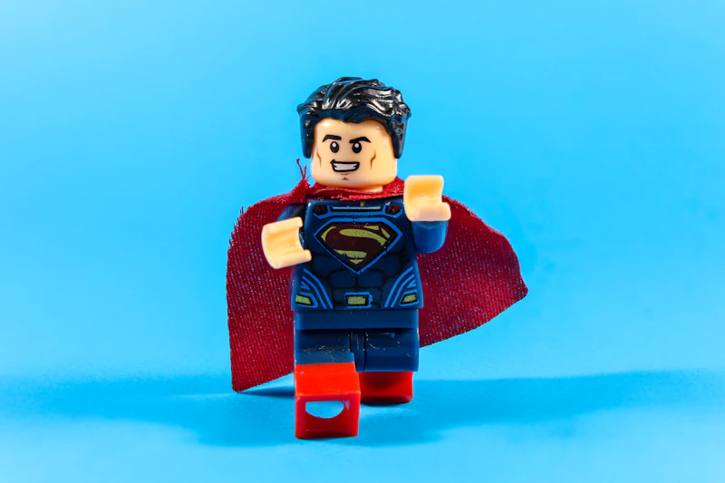 Superhero figurine standing dramatic pose