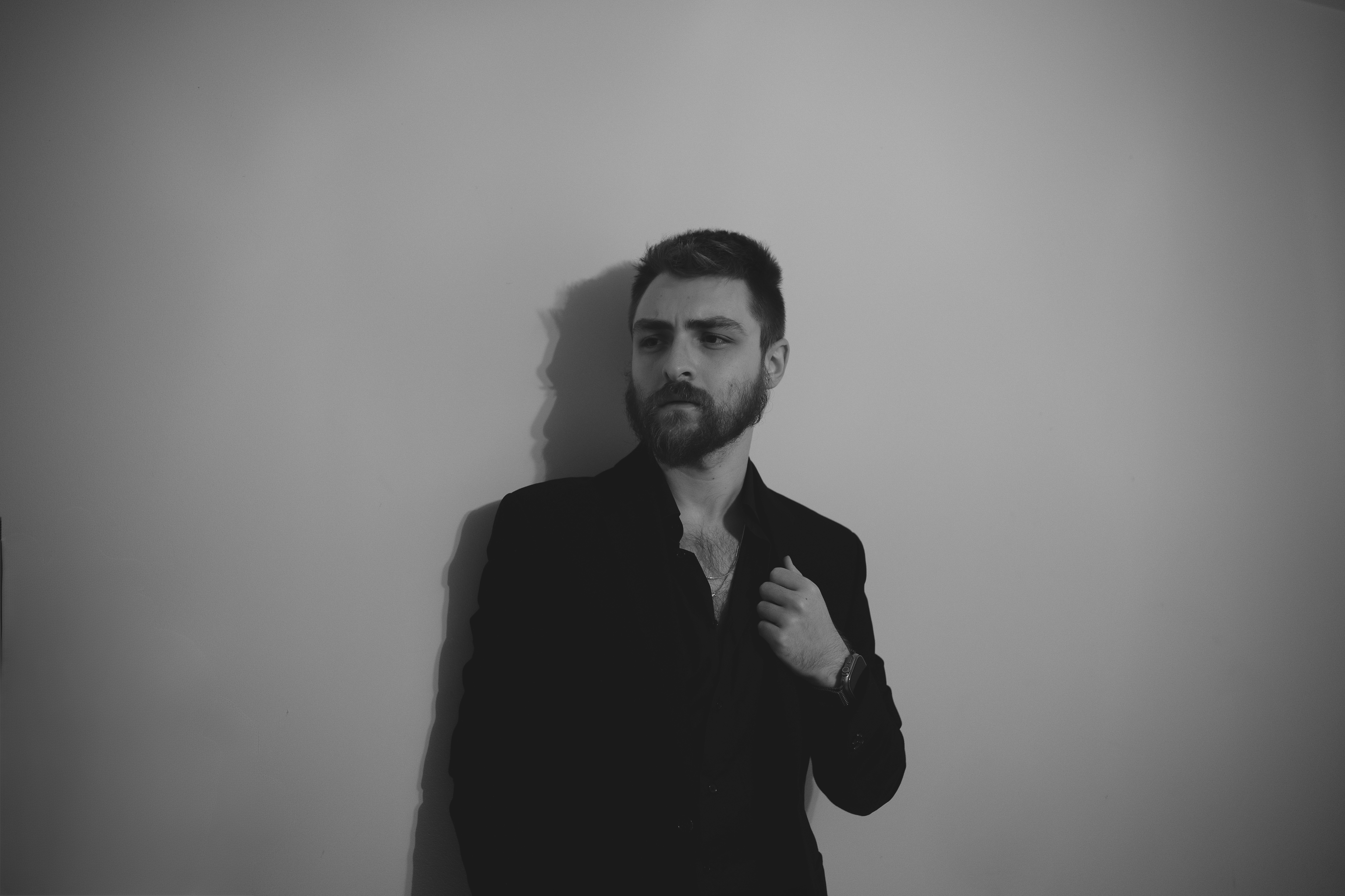 Elegant male model in black jacket