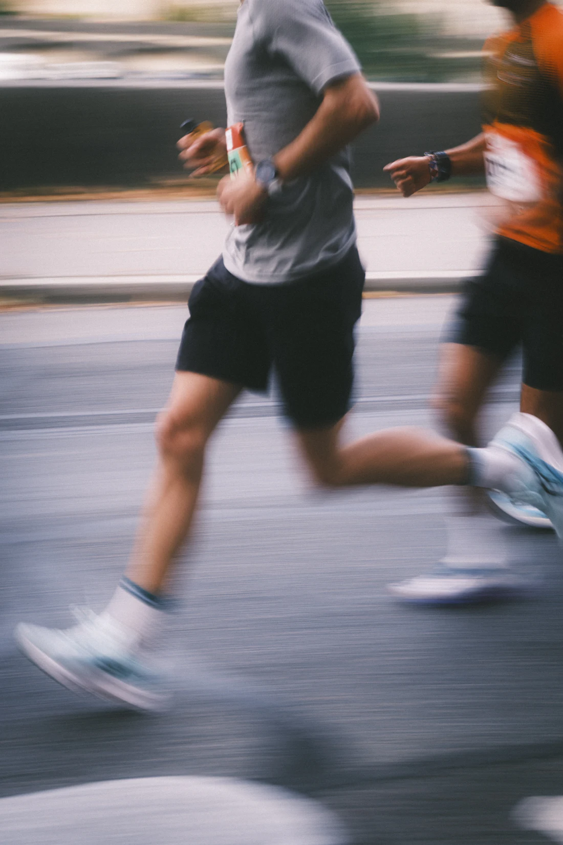 Runners in a race, caught in motion blur