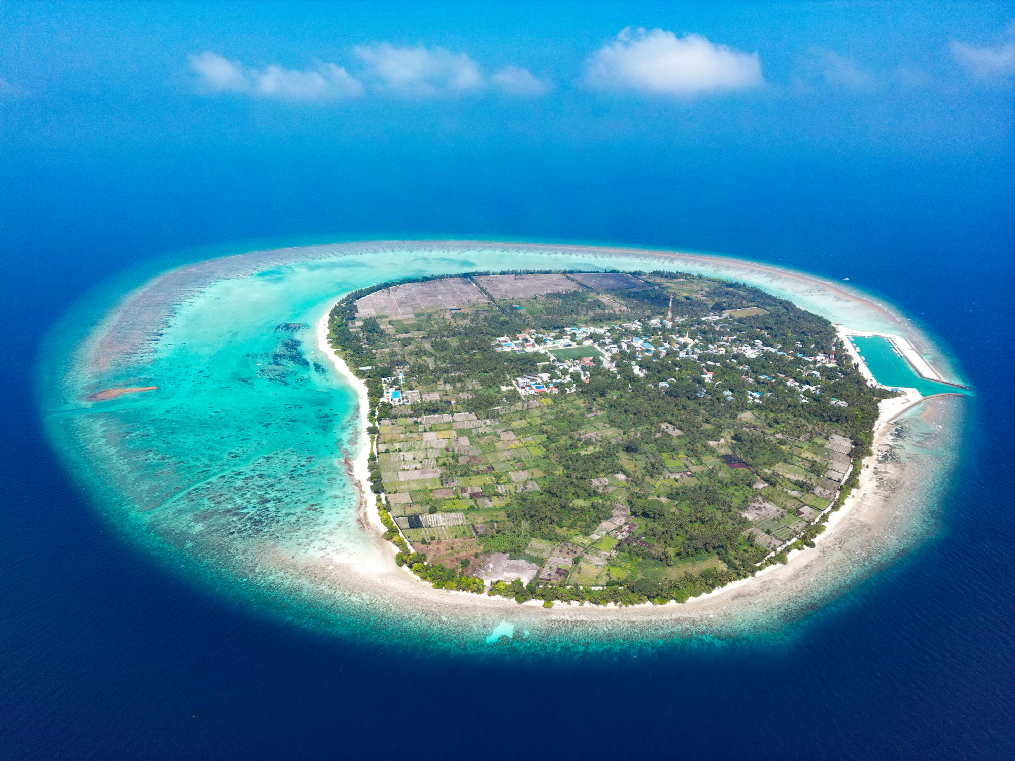Aerial view of Thoddoo and its surrounding turquoise lagoon
