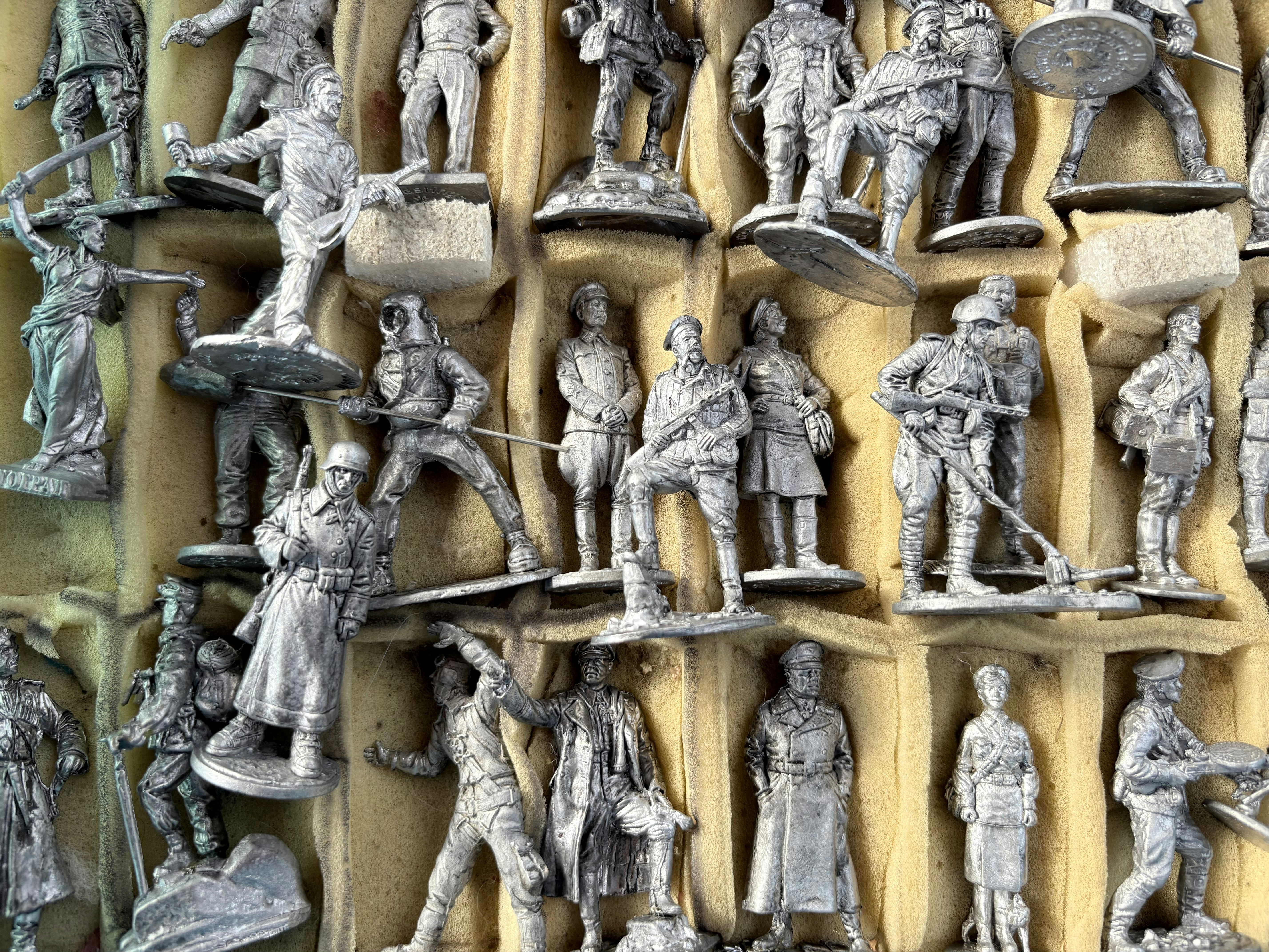 Collection of vintage metal soldier figurines