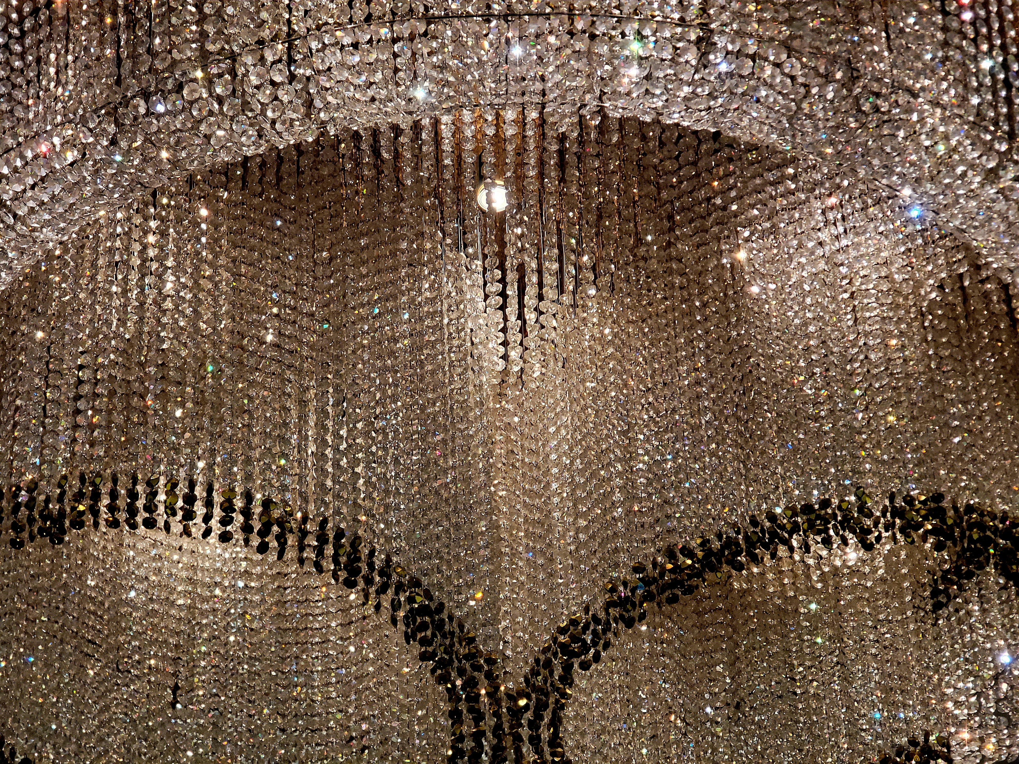 Elaborate crystal chandelier with cascading strands