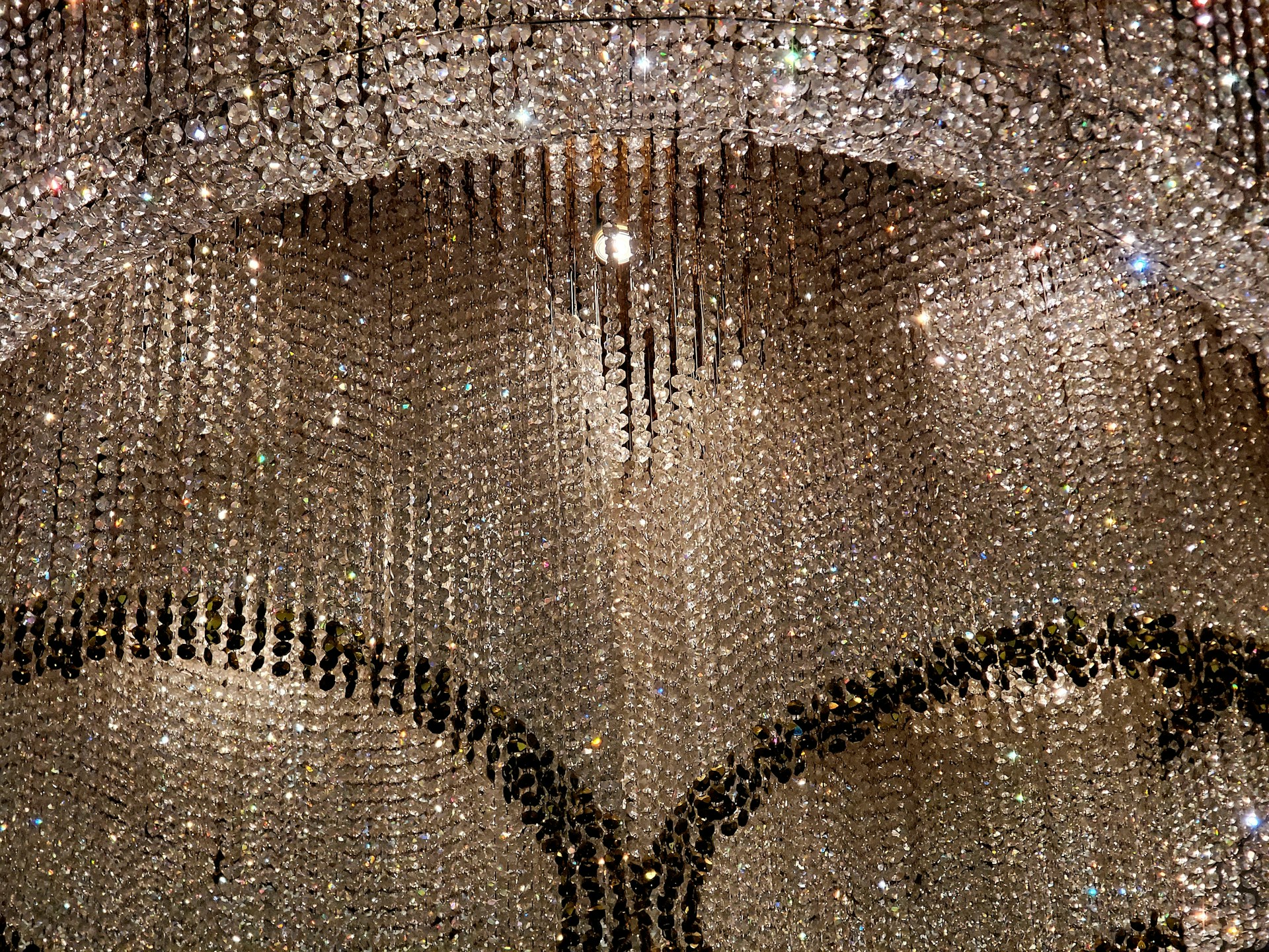 Elaborate crystal chandelier with cascading strands