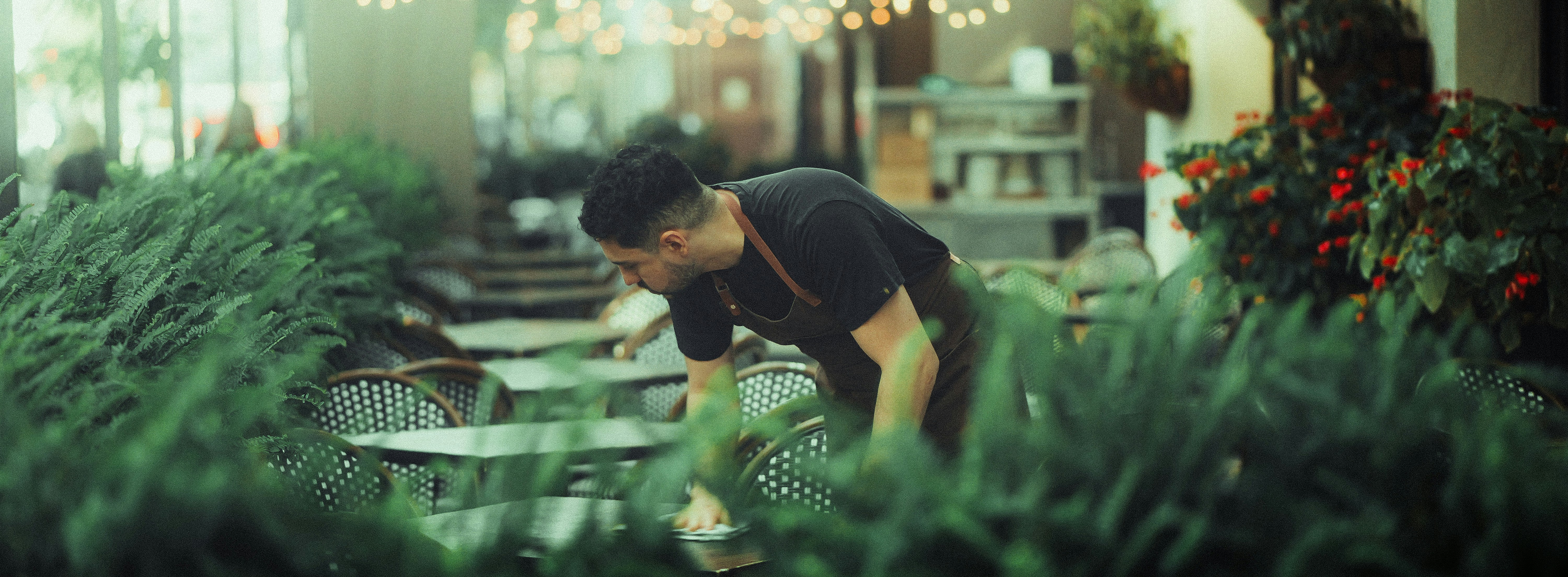 Staff member with plants