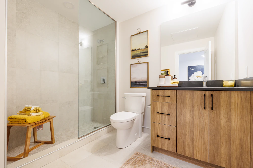 Clean modern bathroom with vanity and glass shower