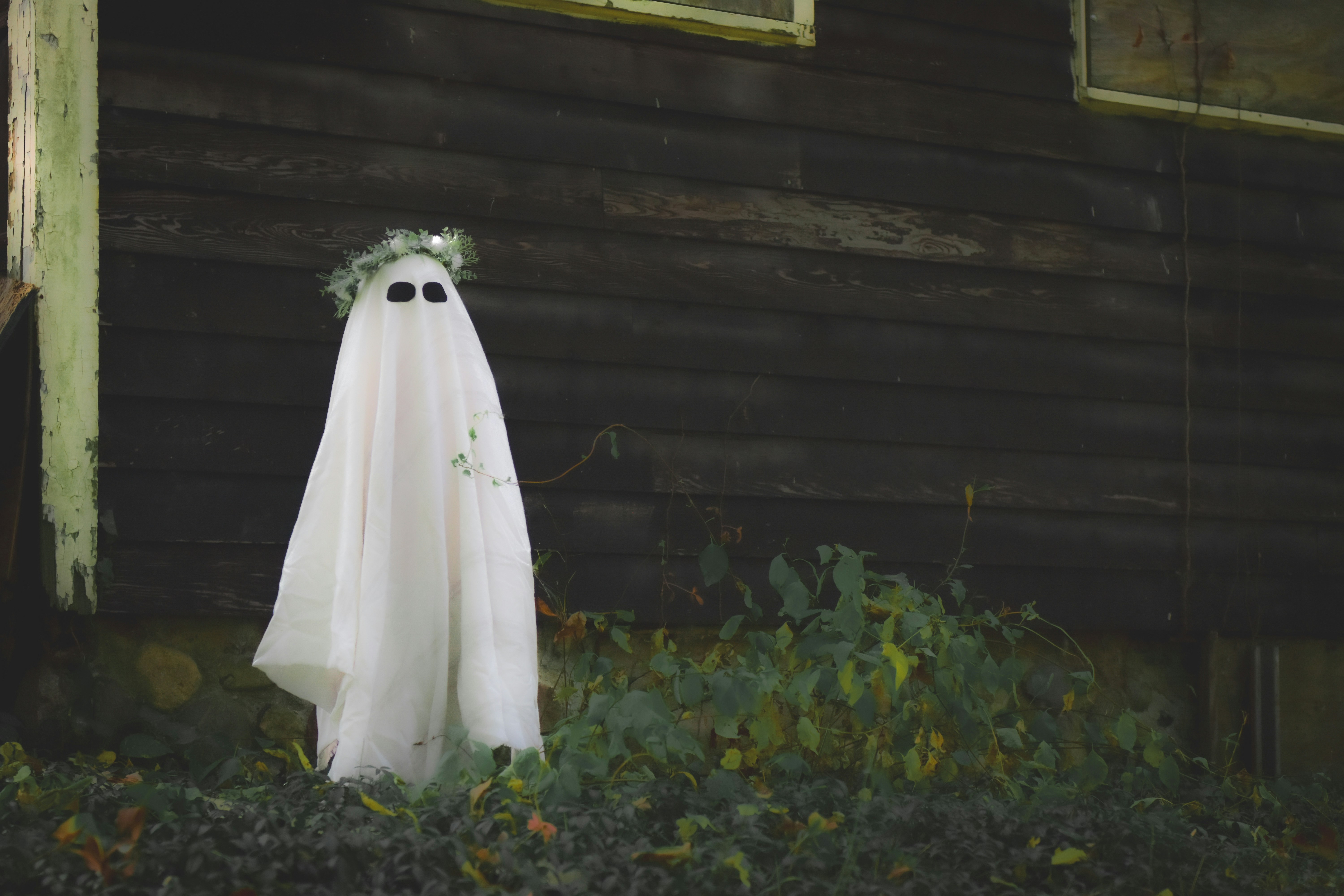 White ghost costume with wreath