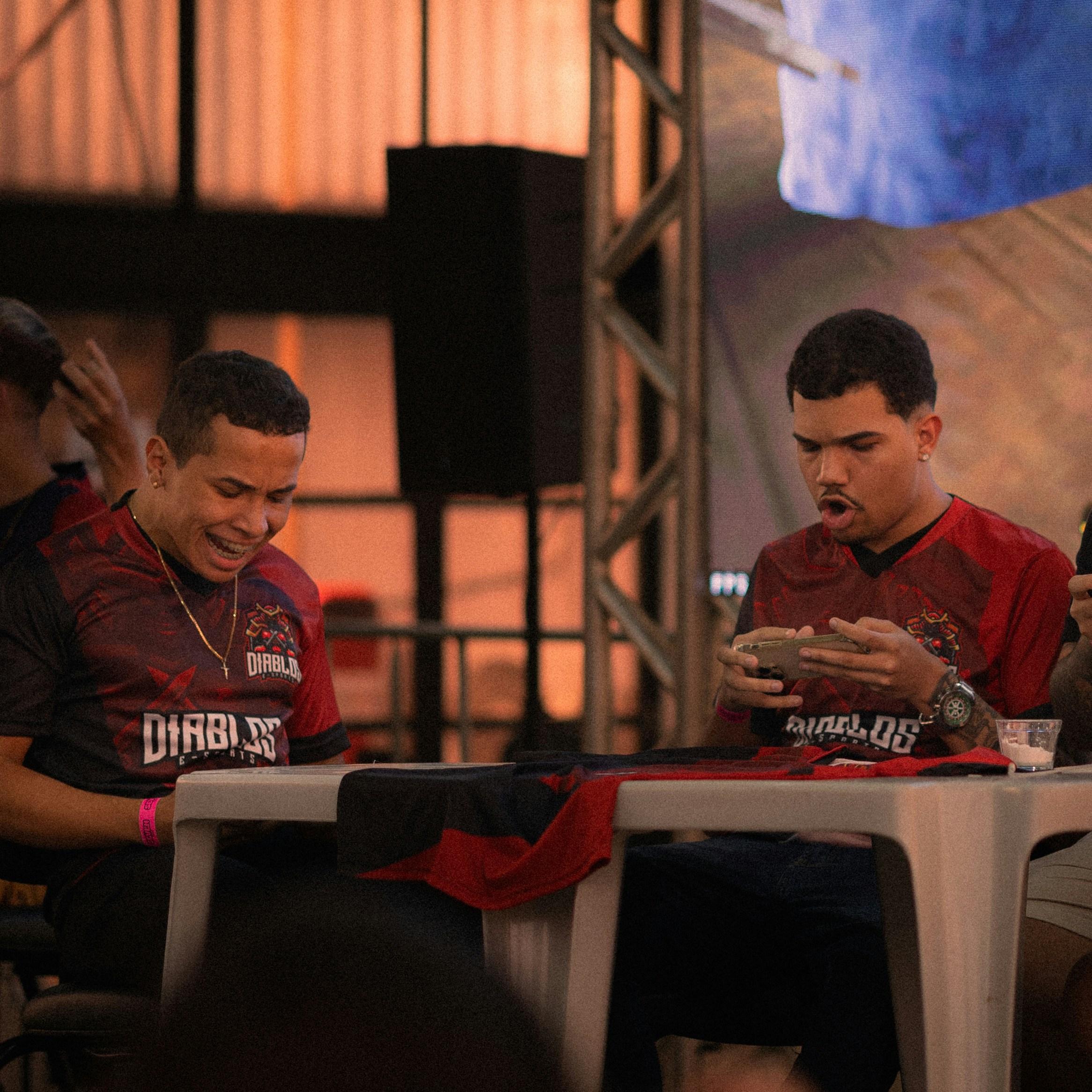 Two men playing video games together