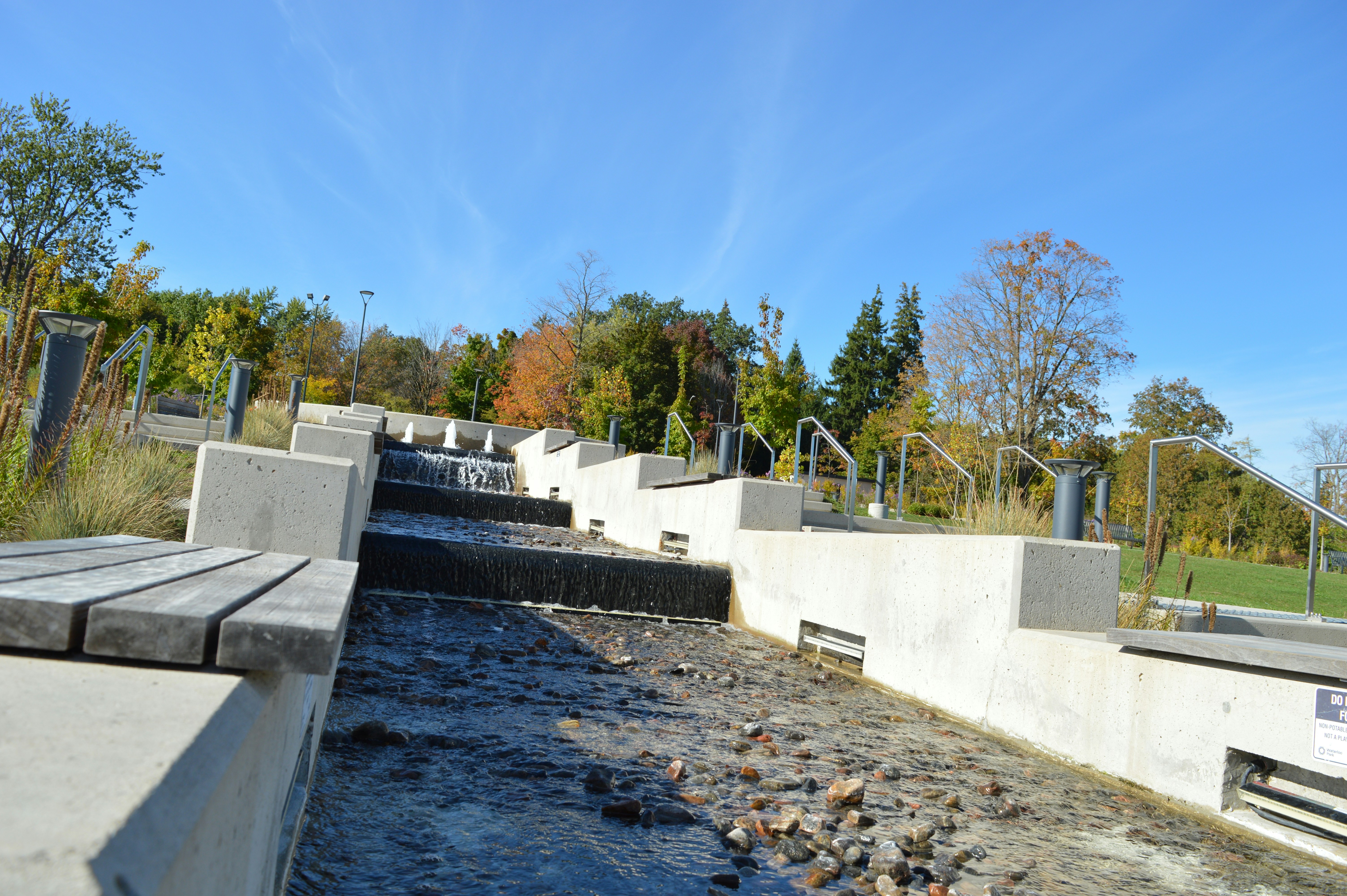 Water flowing down concrete steps in a park