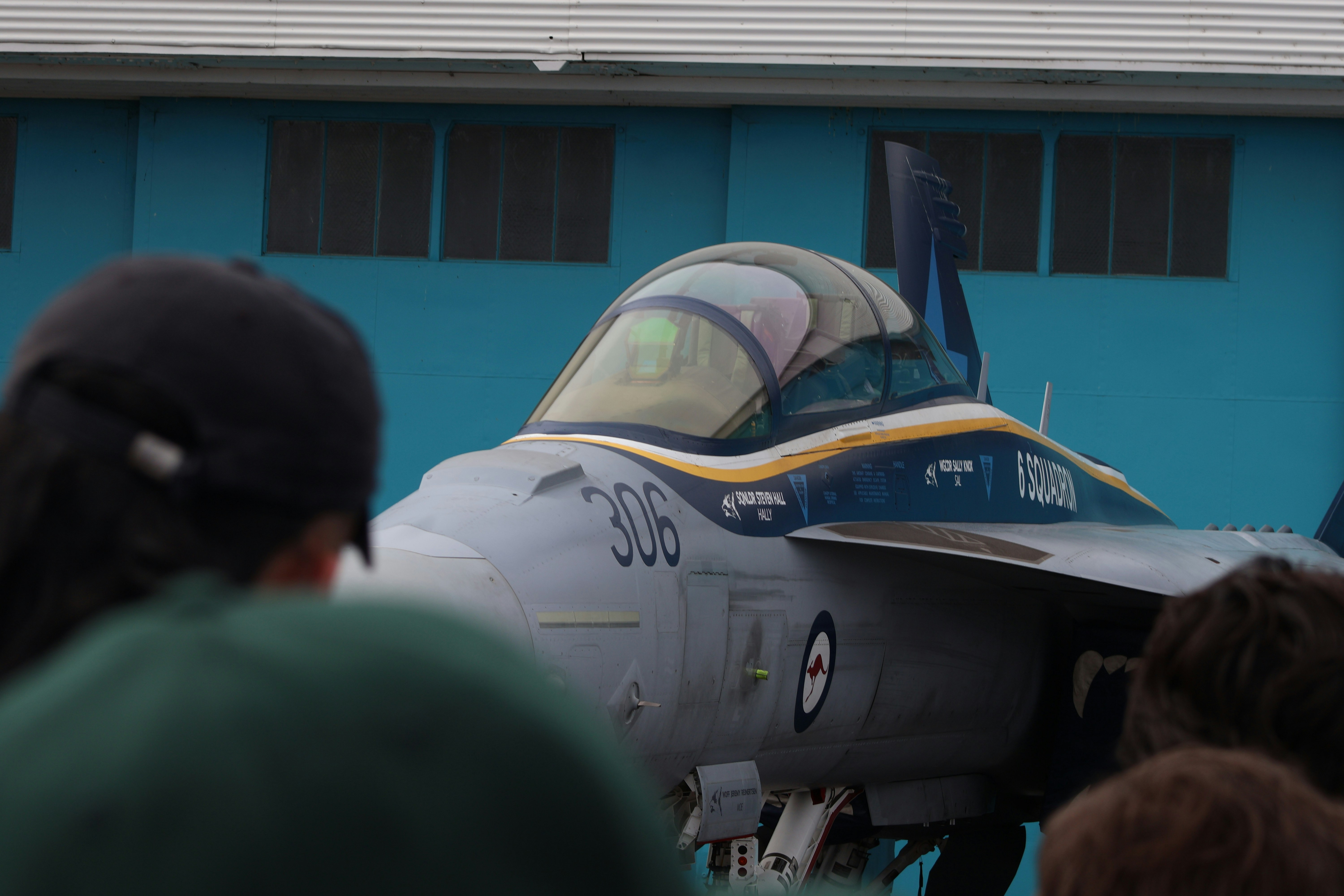 Fighter jet with number 306 on display