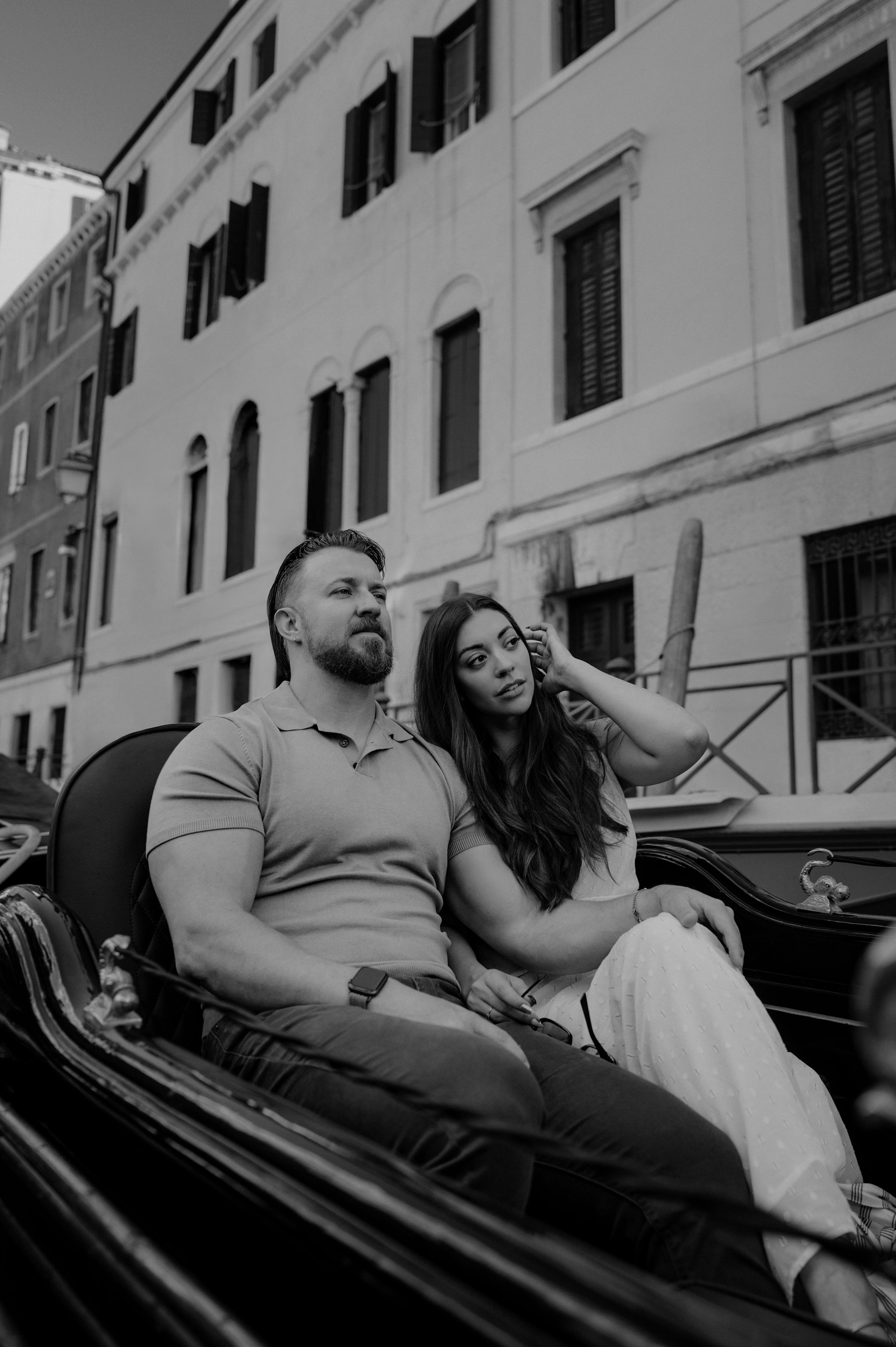 Couple enjoying a gondola ride in venice