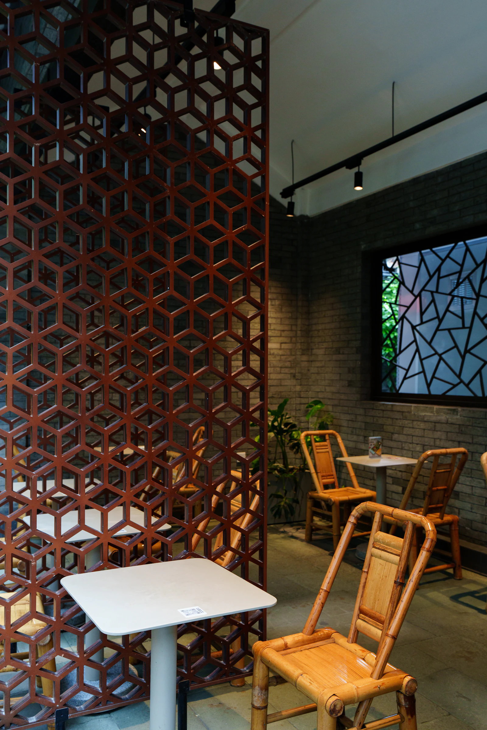 Bamboo-inspired cafe interior with natural furniture