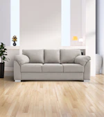 A light grey sofa in a modern living room.