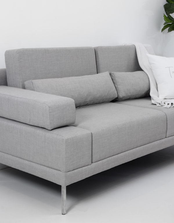 A cosy common lounge with a sofa for relaxing and watching TV