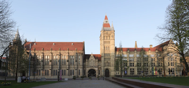 Stone tower of the University of Manchester on Oxford Road, Manchester