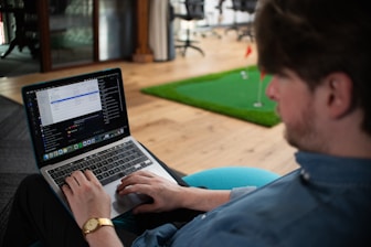Man working on a laptop in an office