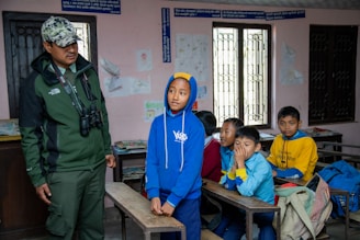 Ranger teaching children in a classroom