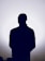 Silhouette of a person against a bright background