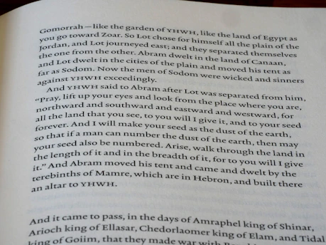 Close-up of text from a book about abraham and lot.
