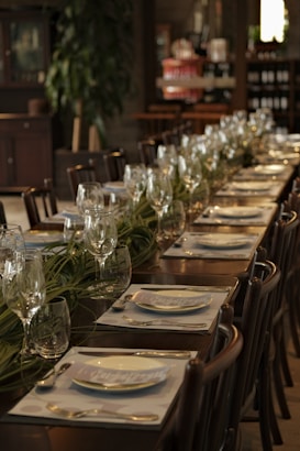 Long dining table set for a formal event.