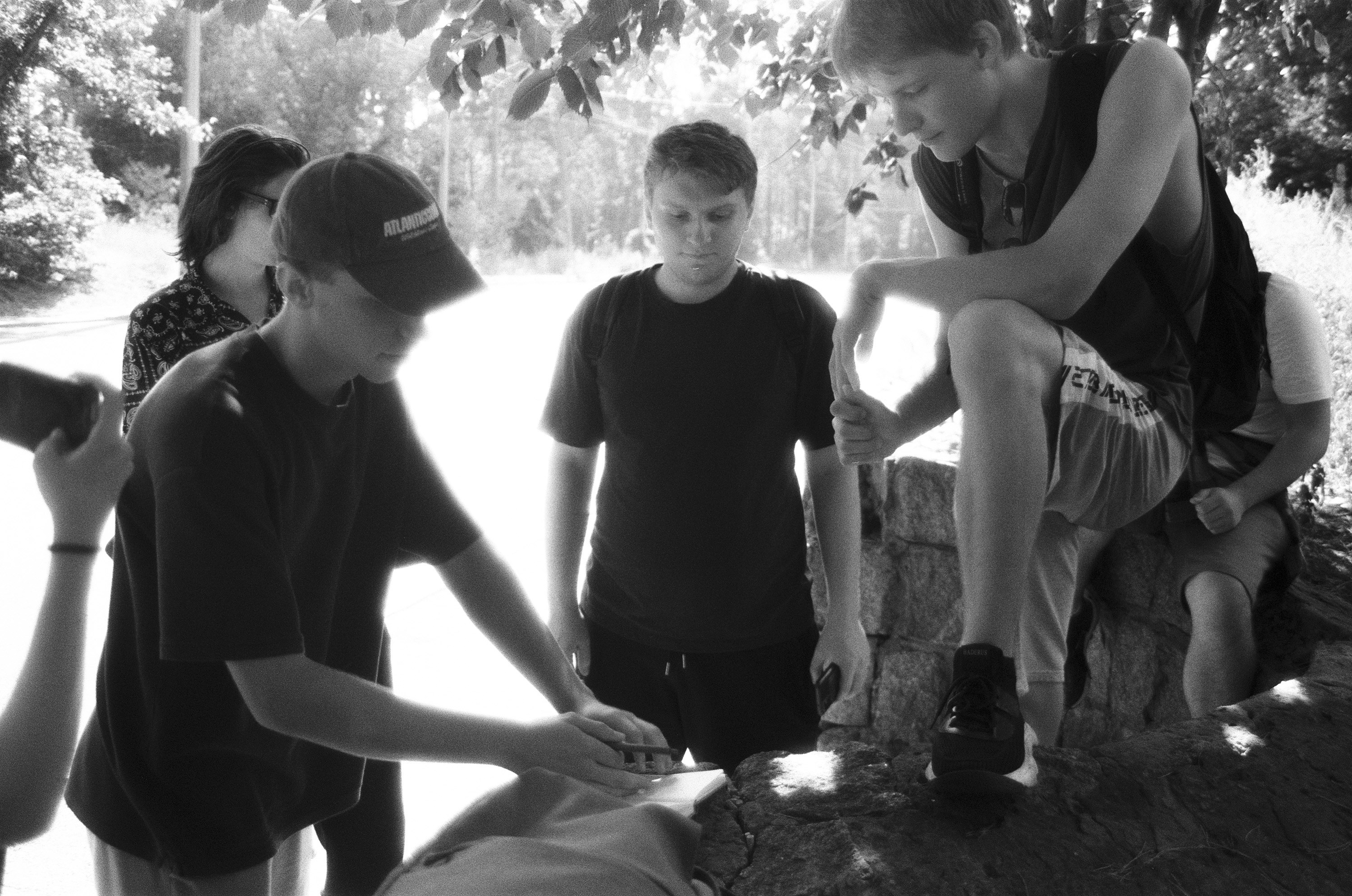 Group of young people gathered outdoors