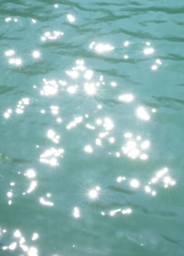 Sparkling sunlight on gentle blue water