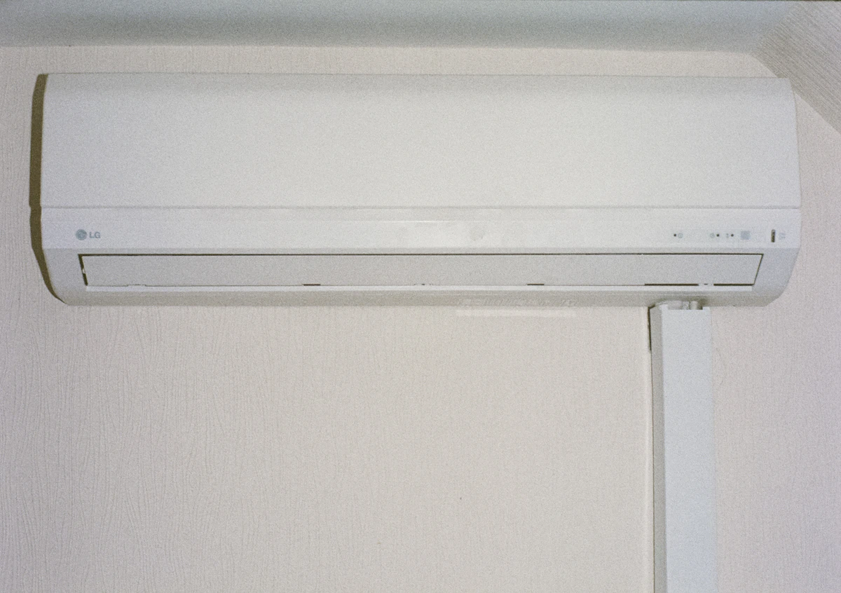 Wall mounted air conditioner in a clean modern room