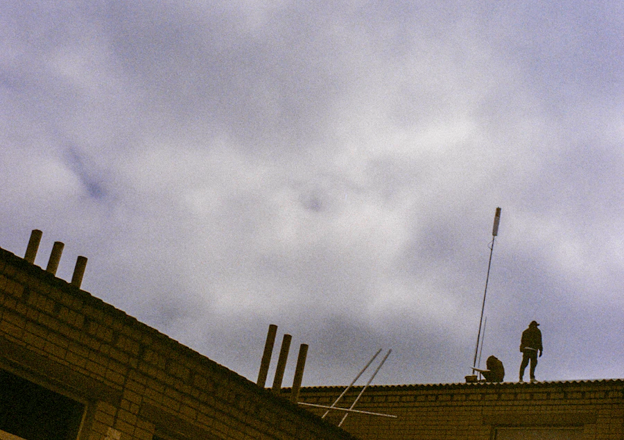 Roofers working on a rooftop