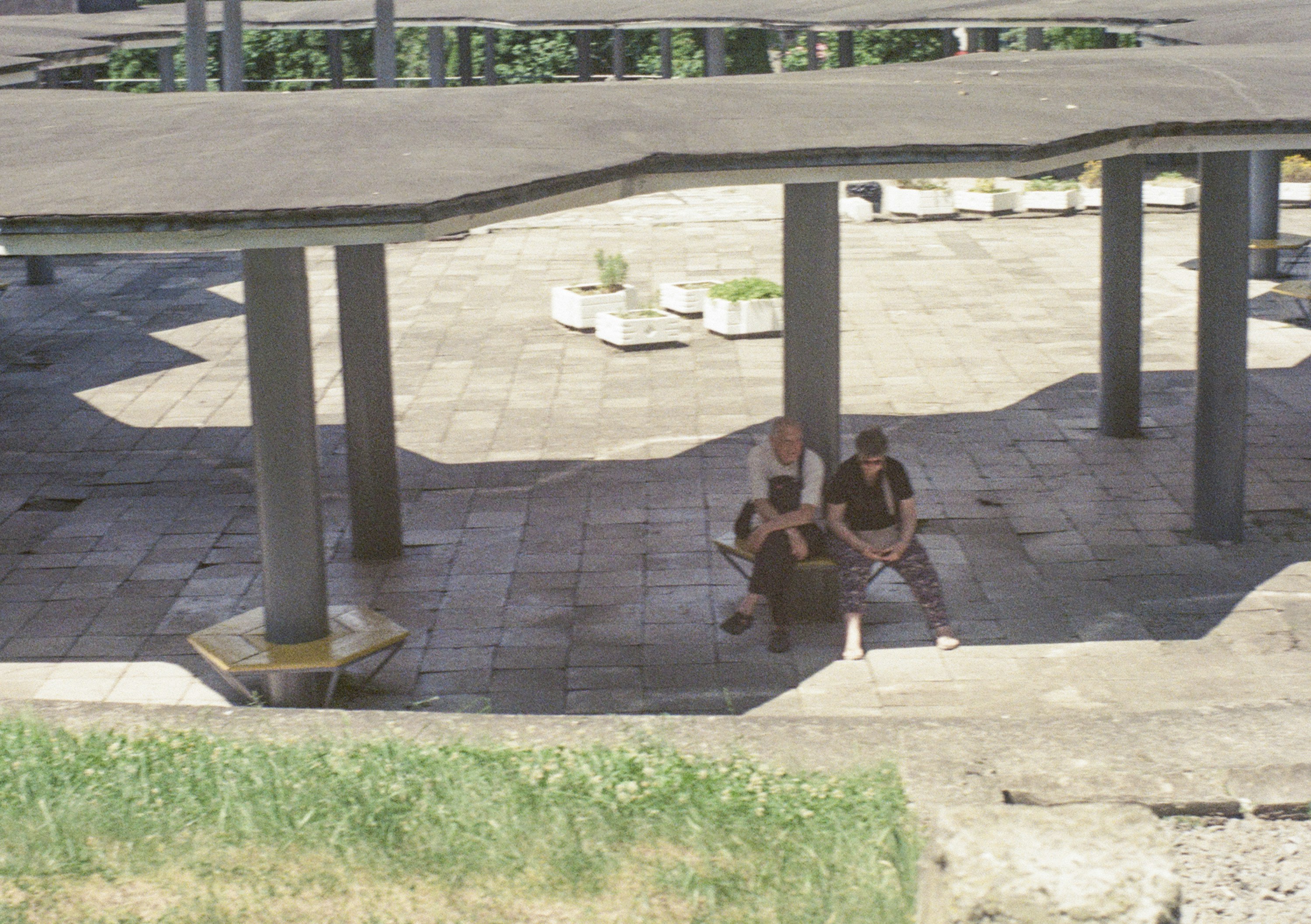family enjoying new concrete patio - concrete installation cost delaware oh
