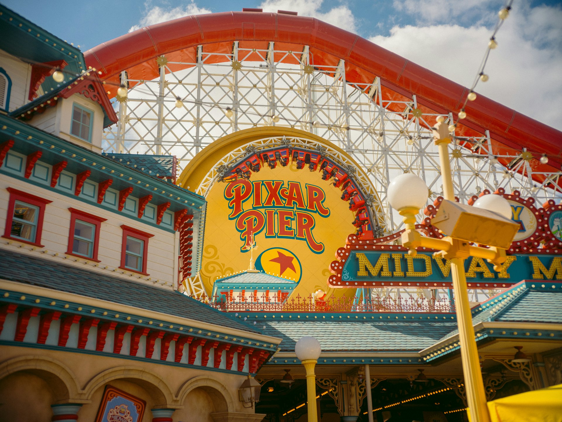 Pixar pier amusement park with rollercoaster