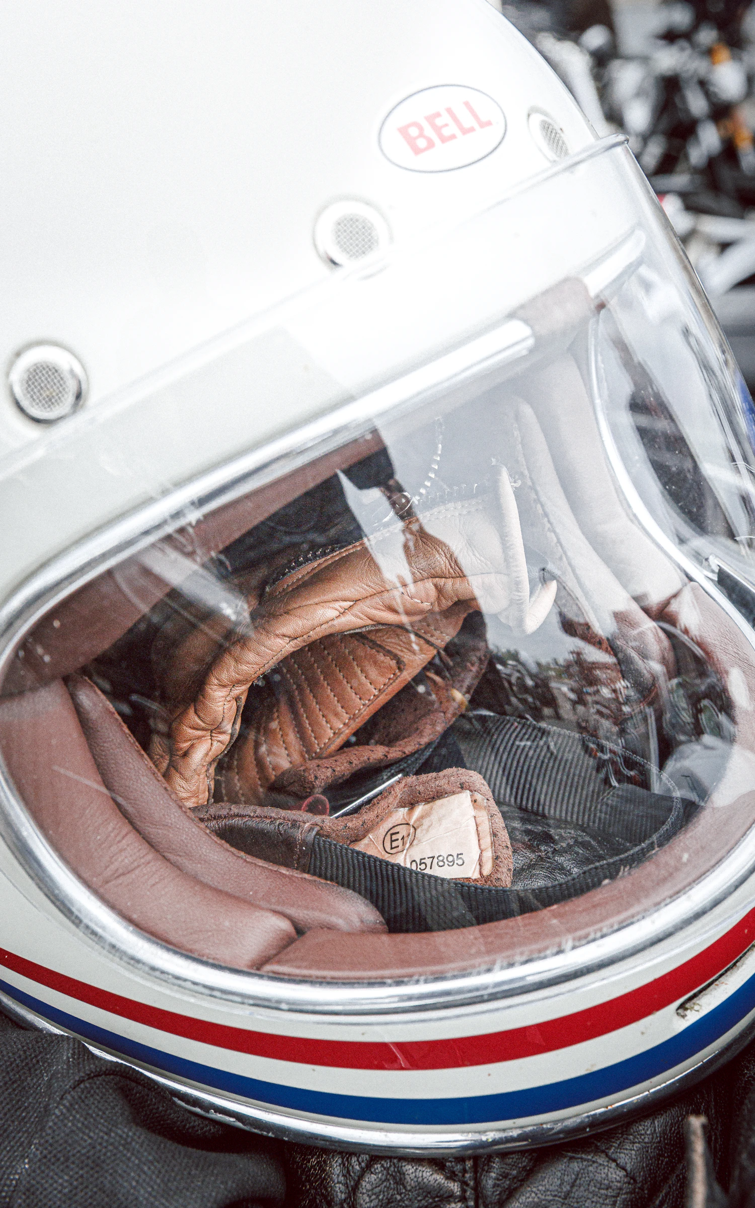 White open helmet with clear visor and leather lining