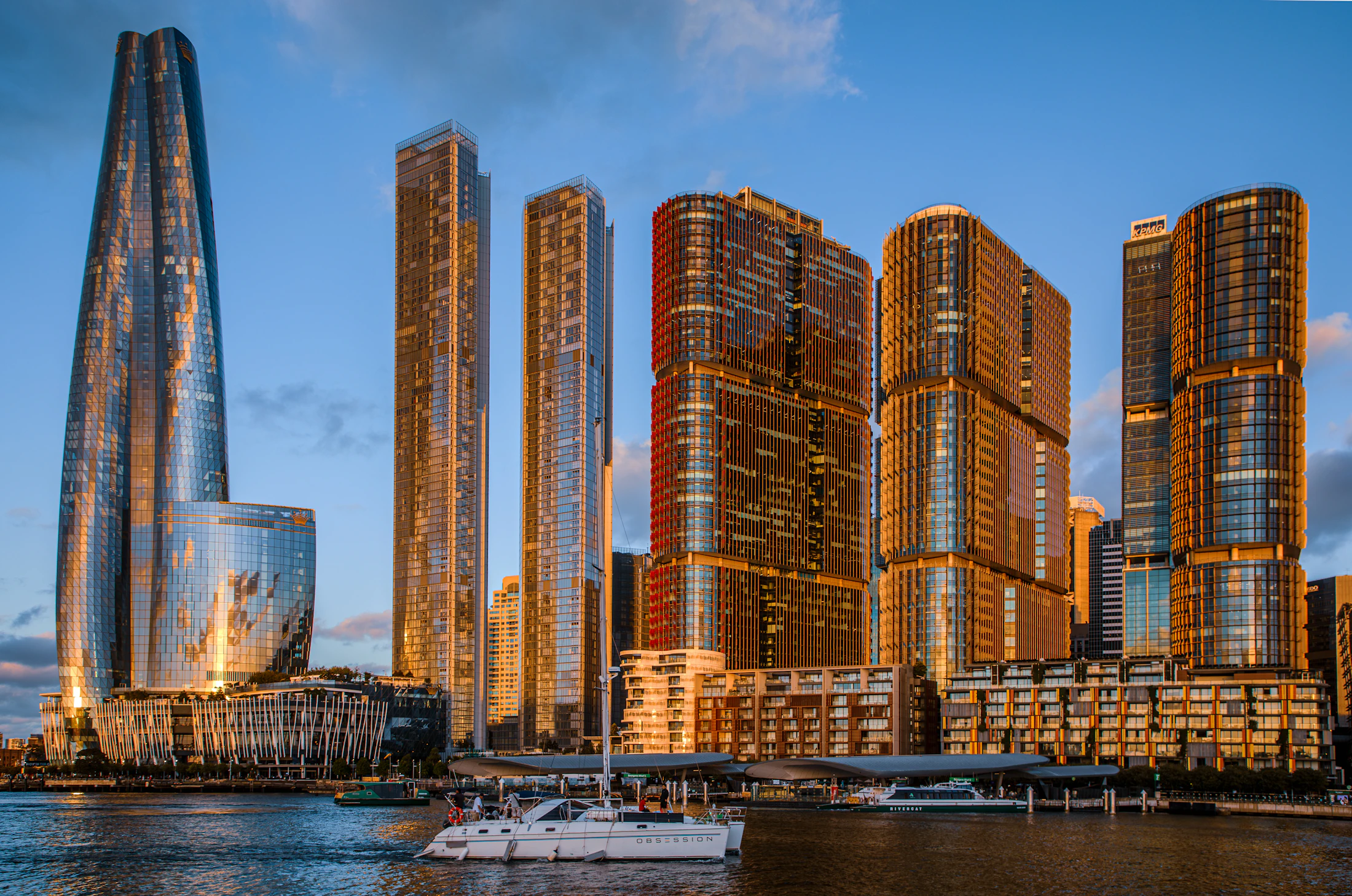 Office towers of Barangaroo, Sydney, reflecting late afternoon light across Darling Harbour