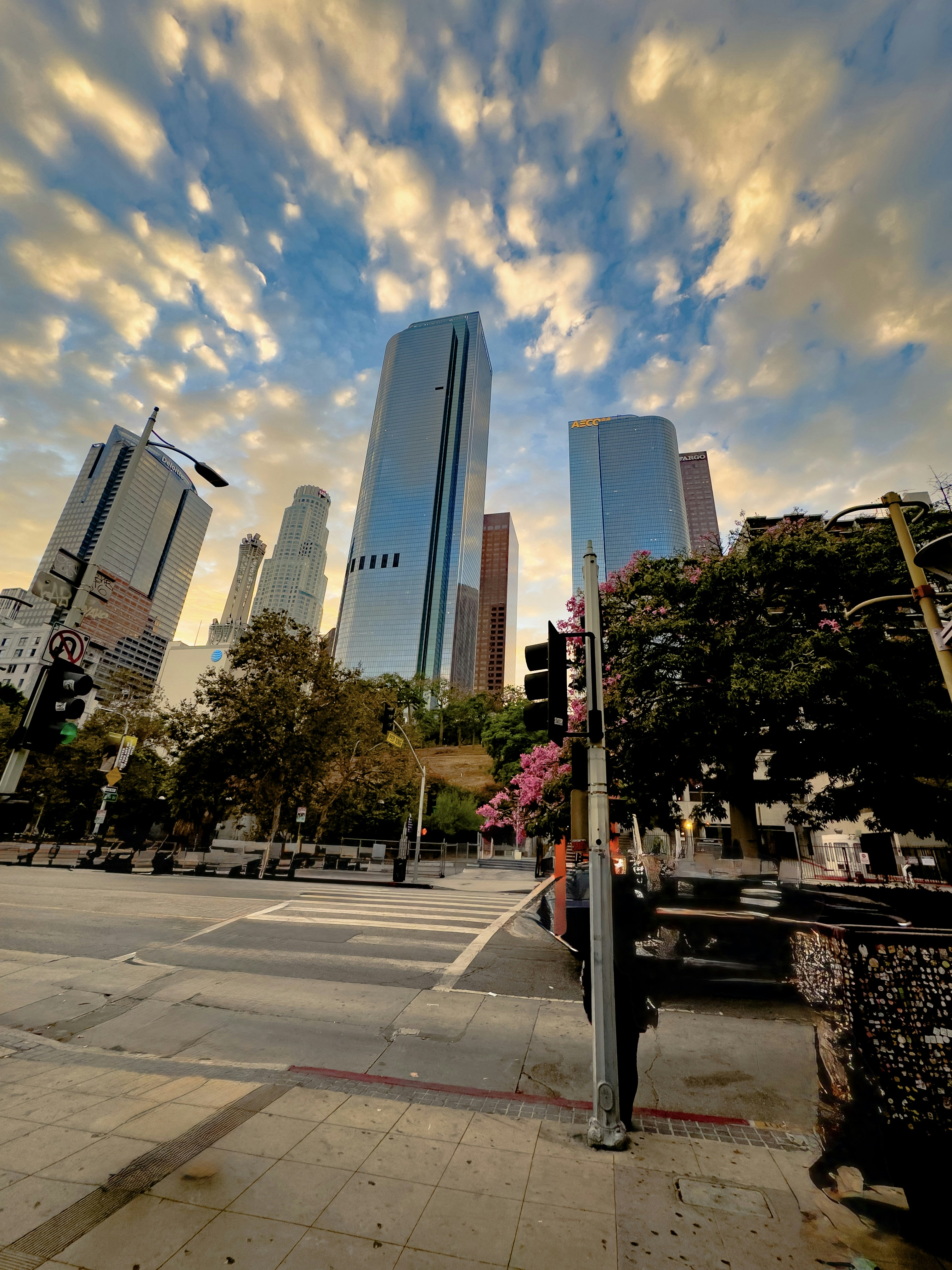 Downtown city skyline with clouds at sunset