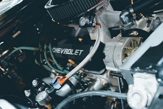 Close-up of a chevrolet engine with many parts.